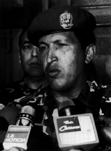 Уго Чавес призывает своих сторонников сложить оружие после..0