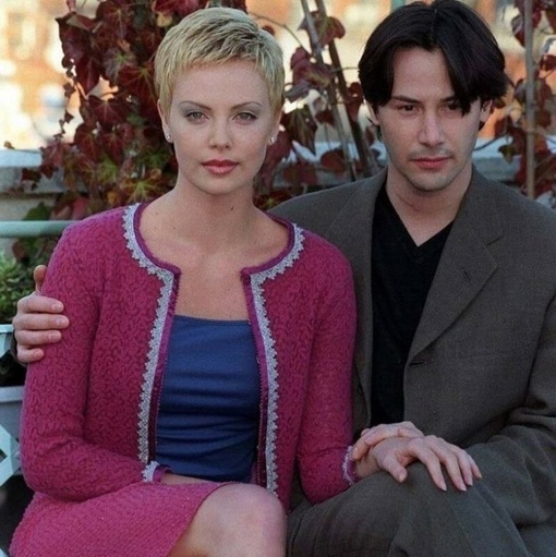 Киану с Шарлиз Терон на фотосессии к фильму Адвоката Дьявола, 1997..0