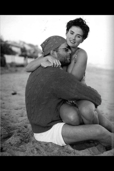 Брюс Уиллис с супругой. Малибу, 1991..0