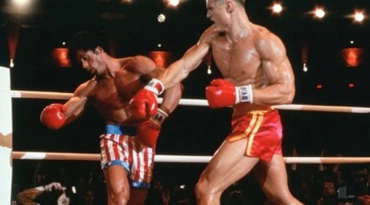 Дольф Лундгрен в роли Ивана Драго — советского военного и..2