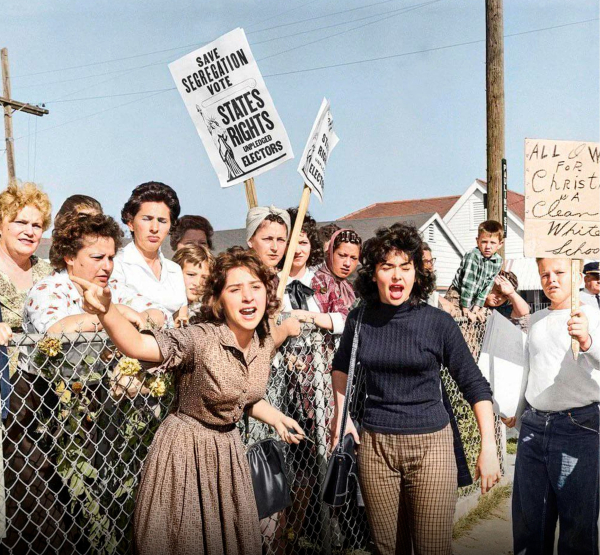 В 1960 году на юге США шестилетняя Руби Бриджес подвергалась..0